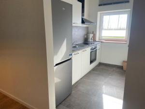 Kuchyň nebo kuchyňský kout v ubytování Ferienwohnung Spitze Warte