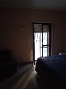 A bed or beds in a room at Le Zagare b&b