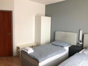 Postel nebo postele na pokoji v ubytování Pension Lara