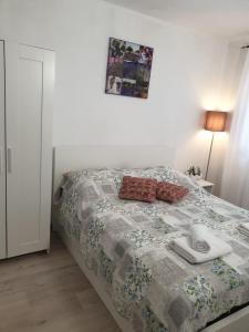 Postel nebo postele na pokoji v ubytování Seaside apartments