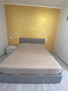 Postel nebo postele na pokoji v ubytování B&b Paradiso Settecannelle