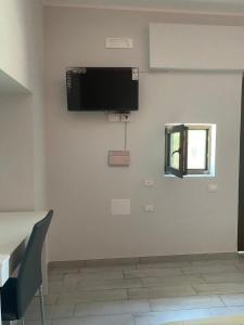 TV a/nebo společenská místnost v ubytování B&b Paradiso Settecannelle