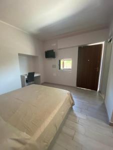 Postel nebo postele na pokoji v ubytování B&b Paradiso Settecannelle