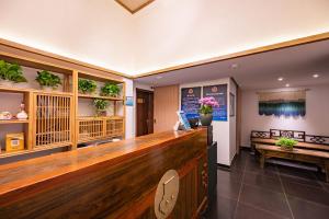 Η κουζίνα ή μικρή κουζίνα στο Qiuguo Hutong Courtyard Hotel