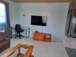 TV a/nebo společenská místnost v ubytování Urania House