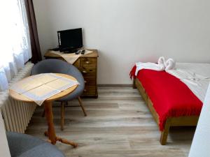 Postel nebo postele na pokoji v ubytování Penzion Vanessa