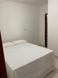 Ένα ή περισσότερα κρεβάτια σε δωμάτιο στο Mellim Residence