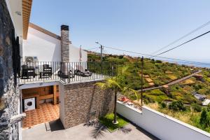 a view from the balcony of a house at Casa Da Portada in Calheta
