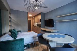 Posteľ alebo postele v izbe v ubytovaní Apartamenty Świnoujście - Lividus 323