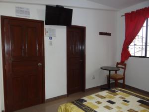TV a/nebo společenská místnost v ubytování Hotel Murcia