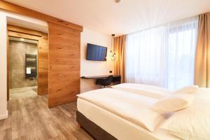 Posteľ alebo postele v izbe v ubytovaní Resort Sněžné AMANITA