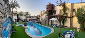 The swimming pool at or close to Naama Inn Hotel