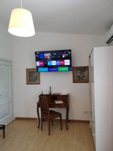 TV tai viihdekeskus majoituspaikassa Il Giardino dei Pini