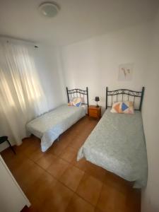 Lova arba lovos apgyvendinimo įstaigoje Conil Terraza y Paz