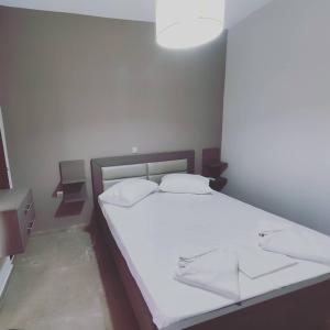 Posteľ alebo postele v izbe v ubytovaní VASO'S APARTMENTS
