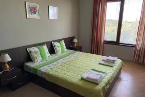 Postel nebo postele na pokoji v ubytování Apartment Doris