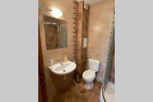 Koupelna v ubytování Apartment Doris + 20 fotografií