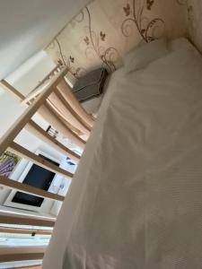 Letto o letti in una camera di Apartmán Slapy-Ždáň