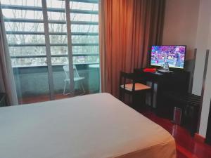 TV/Unterhaltungsangebot in der Unterkunft Hotel Vila Luena