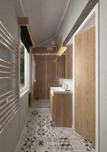 ein Badezimmer mit einem Waschbecken und einer Theke in der Unterkunft Chapel Fields Holiday Park in Chapel Saint Leonards