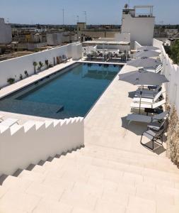 The swimming pool at or close to Appartamento Magnolia Deluxe