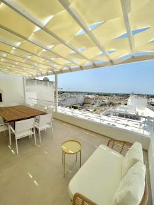 A balcony or terrace at Appartamento Magnolia Deluxe Még 37 kép