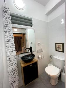 Bathroom sa Berenice Winery Suites