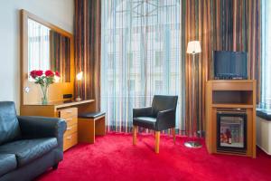 Posedenie v ubytovaní Theatrino Hotel