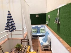 Łóżko lub łóżka w pokoju w obiekcie Ílios Apartamentos