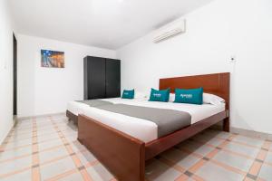 Llit o llits en una habitació de Ayenda Oporto Suites