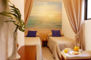 Fotografie z fotogalerie ubytování Studio with access to the garden. Open pool. Beach very close. Wifi & Netflix FREE v destinaci Benalmádena + 32 fotografií
