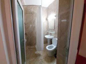 Een badkamer bij Vila Aren