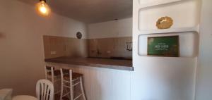 A kitchen or kitchenette at Viviendas Ferrer-Es Mal Pas