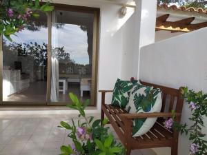 A garden outside Viviendas Ferrer-Es Mal Pas
