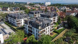 uma vista aérea de uma cidade com edifícios em Amber Baltic Apartment em Gdansk