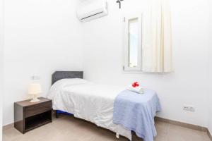 Postel nebo postele na pokoji v ubytování Villa Dunas in Cala Dor