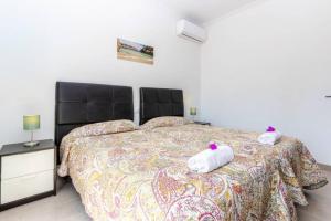 Postel nebo postele na pokoji v ubytování Villa Dunas in Cala Dor