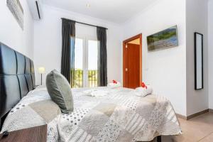Postel nebo postele na pokoji v ubytování Villa Dunas in Cala Dor
