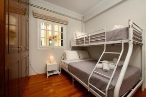 Posteľ alebo postele v izbe v ubytovaní Grand Villa Roubana