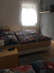 Postel nebo postele na pokoji v ubytování Ubytování Mája