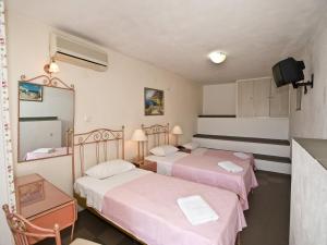 Postel nebo postele na pokoji v ubytování Vana Holidays