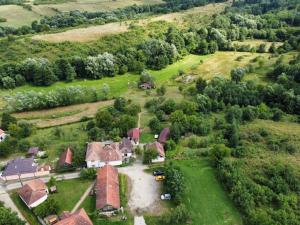 an aerial view of a house in a field at Camping Zamolxe in Sarmizegetusa
