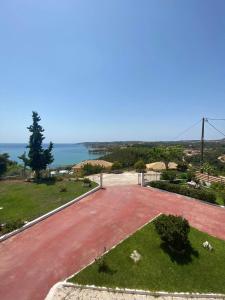 a view of the ocean from the roof of a house at Maria Anastasia Studios in Trapezaki