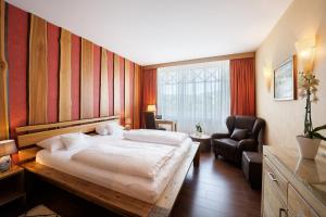 Postel nebo postele na pokoji v ubytování Hotel Weisser Bär