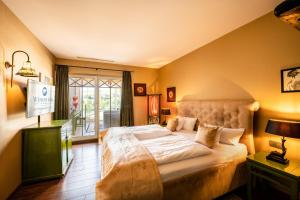 Postel nebo postele na pokoji v ubytování Hotel Weisser Bär
