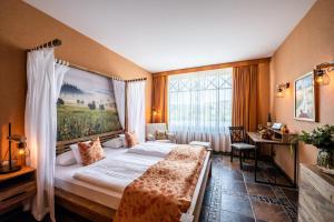 Postel nebo postele na pokoji v ubytování Hotel Weisser Bär