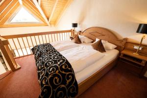 Postel nebo postele na pokoji v ubytování Hotel Weisser Bär
