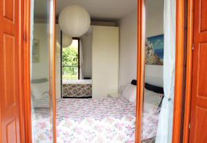 A bed or beds in a room at Appartemento Stella