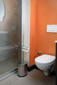 a bathroom with a toilet and a shower at Acar Suite Hotel in Istanbul +35 photos