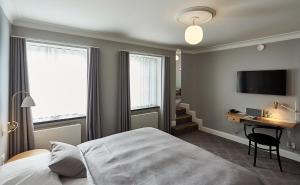 Letto o letti in una camera di Hotel Randers
